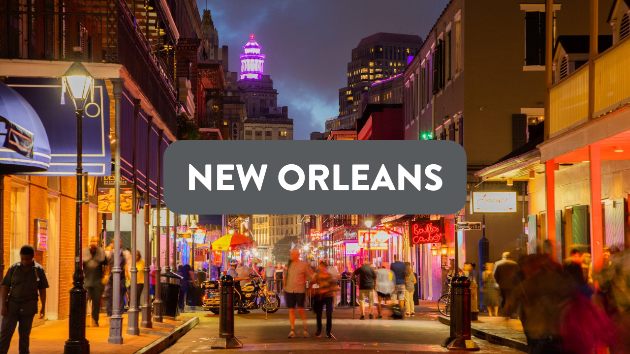 NEW ORLEANS CITY SCAPE AT NIGHT. TEXT READS NEW ORLEANS.